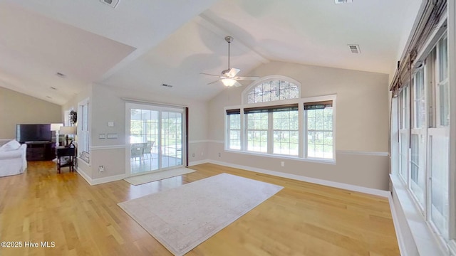 2019 Royal Pines Dr, New Bern, NC 28560 - living room featuring vaulted ceiling, light wood-style flooring, a ceiling fan, and baseboards