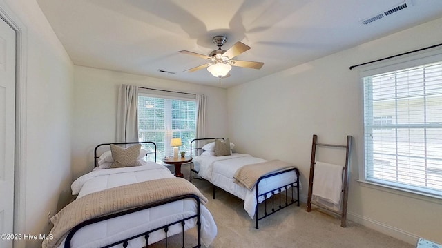 2019 Royal Pines Dr, New Bern, NC 28560 - bedroom featuring light carpet, baseboards, and ceiling fan
