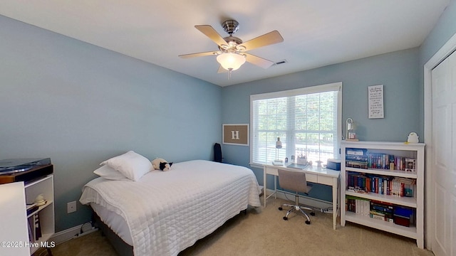 2019 Royal Pines Dr, New Bern, NC 28560 - carpeted bedroom featuring a desk, ceiling fan, and baseboards