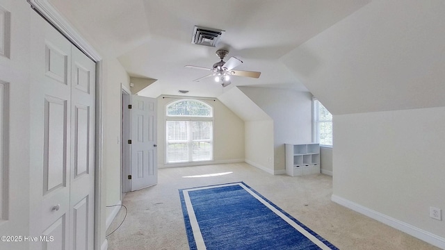 2019 Royal Pines Dr, New Bern, NC 28560 - additional living space featuring carpet floors, lofted ceiling, a ceiling fan, and baseboards