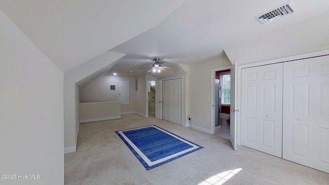 2019 Royal Pines Dr, New Bern, NC 28560 - unfurnished bedroom with light colored carpet, lofted ceiling, ensuite bathroom, and baseboards