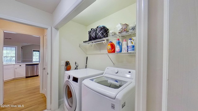 2019 Royal Pines Dr, New Bern, NC 28560 - laundry room featuring washer and dryer and light wood finished floors
