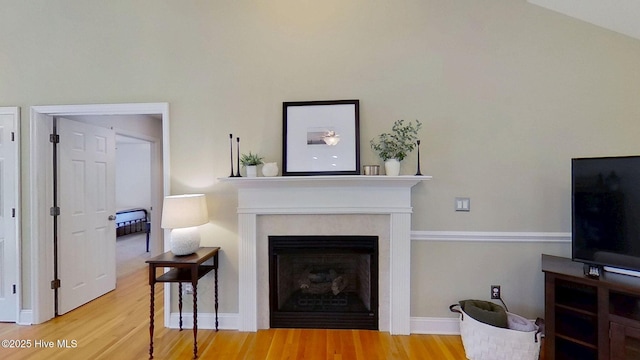 2019 Royal Pines Dr, New Bern, NC 28560 - living area with wood finished floors, a fireplace with flush hearth, and baseboards