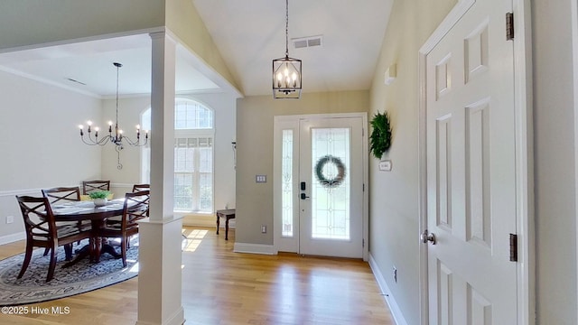 2019 Royal Pines Dr, New Bern, NC 28560 - foyer with a chandelier, light wood-type flooring, baseboards, and lofted ceiling