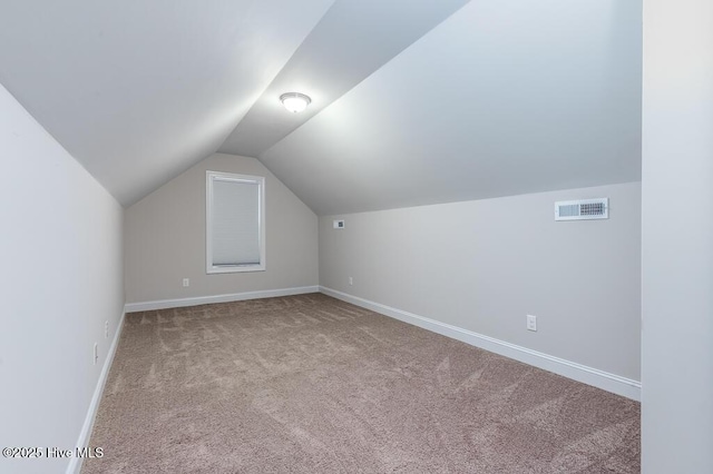 1000 Spot Cir, New Bern, NC 28562 - bonus room with carpet floors, lofted ceiling, and baseboards