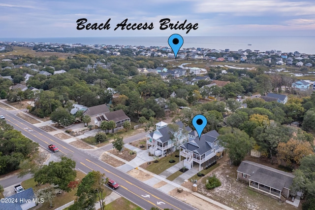 1605 E Oak Island Dr, Oak Island, NC 28465 - aerial view of residential area featuring a large body of water