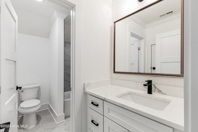 1605 E Oak Island Dr, Oak Island, NC 28465 - bathroom with marble look tiles, vanity, ornamental molding, toilet, and baseboards