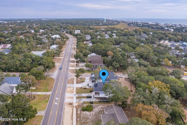 1605 E Oak Island Dr, Oak Island, NC 28465 - aerial view of property and surrounding area featuring nearby suburban area
