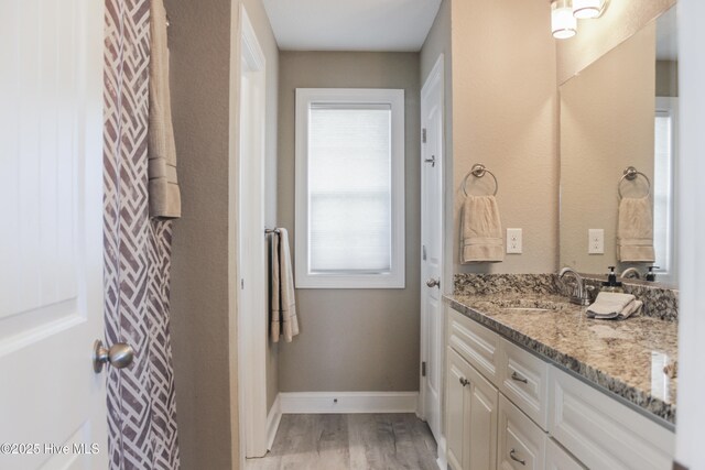 284 Old Swamp Rd, South Mills, NC 27976 - bedroom with light colored carpet, multiple windows, and baseboards