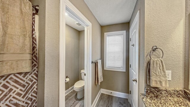284 Old Swamp Rd, South Mills, NC 27976 - bedroom with light colored carpet, baseboards, and a ceiling fan