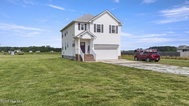 284 Old Swamp Rd, South Mills, NC 27976 - view of side of property featuring driveway, a garage, a yard, and a view of countryside