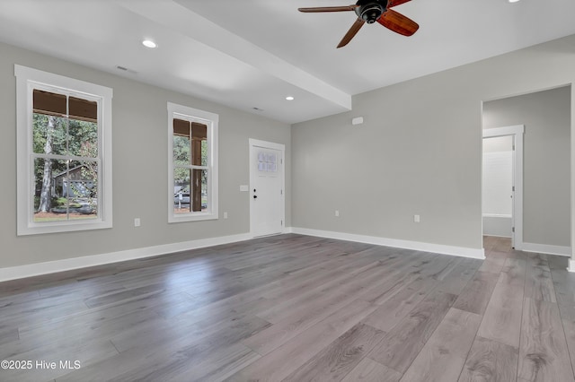 340 Persimmon Rd SW, Calabash, NC 28467 - unfurnished living room with ceiling fan, wood finished floors, and recessed lighting