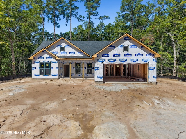 340 Persimmon Rd SW, Calabash, NC 28467 - property in mid-construction featuring a garage