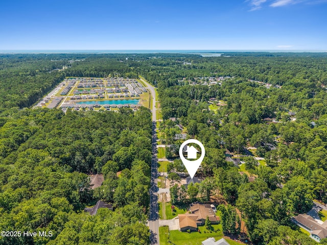 340 Persimmon Rd SW, Calabash, NC 28467 - bird's eye view of a heavily wooded area and a nearby body of water
