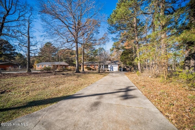 10179 NC Highway 305, Jackson, NC 27845 - ranch-style home featuring driveway and a front yard