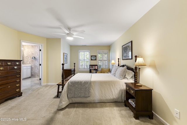 3863 Daphine Ct, Wilmington, NC 28409 - bedroom featuring light colored carpet, baseboards, connected bathroom, and ceiling fan
