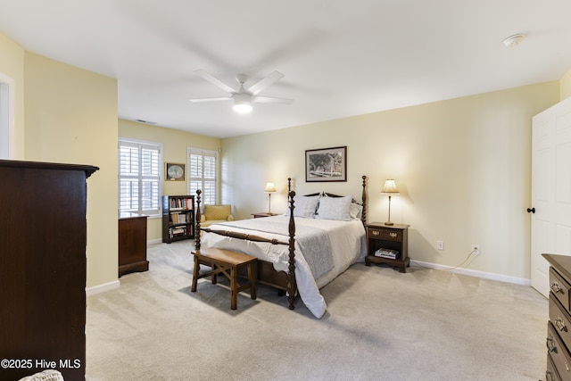 3863 Daphine Ct, Wilmington, NC 28409 - bedroom featuring baseboards, light carpet, and ceiling fan
