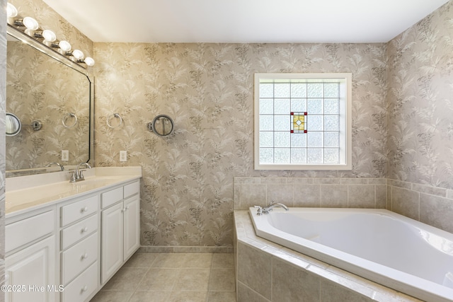 3863 Daphine Ct, Wilmington, NC 28409 - bathroom featuring tile patterned floors, vanity, a garden tub, and baseboards