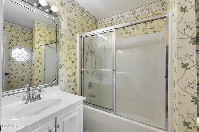 3863 Daphine Ct, Wilmington, NC 28409 - bathroom with wallpapered walls, vanity, and enclosed tub / shower combo