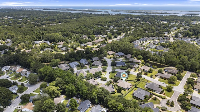 3863 Daphine Ct, Wilmington, NC 28409 - aerial overview of property's location with a nearby body of water, nearby suburban area, and a heavily wooded area