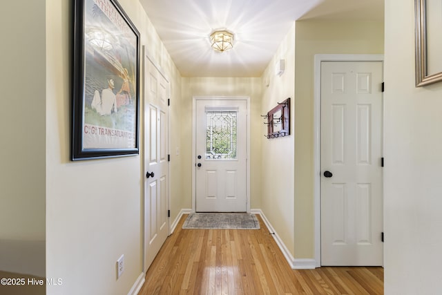 3863 Daphine Ct, Wilmington, NC 28409 - doorway featuring light wood-type flooring and baseboards