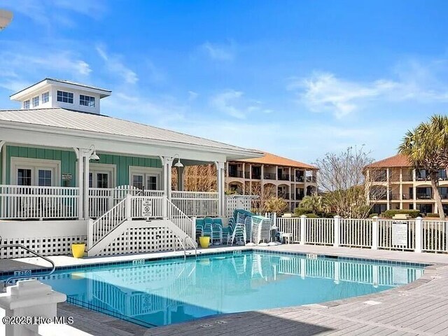 1523 Island Marina Dr, Carolina Beach, NC 28428 - community pool with french doors