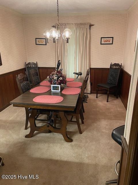 7584 County Home Rd, Ayden, NC 28513 - carpeted dining area with wallpapered walls, wainscoting, a chandelier, and crown molding