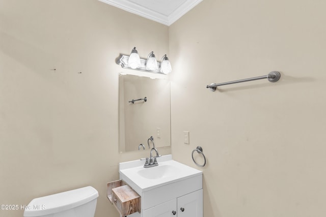 214 Frink Dr, Southport, NC 28461 - bathroom featuring vanity, ornamental molding, and toilet