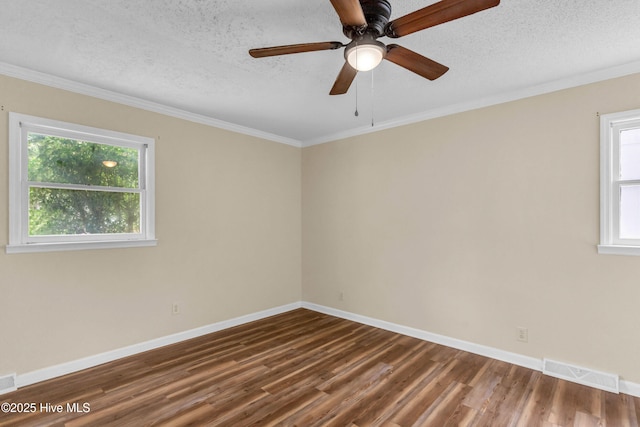 214 Frink Dr, Southport, NC 28461 - empty room featuring wood finished floors, baseboards, crown molding, a textured ceiling, and ceiling fan