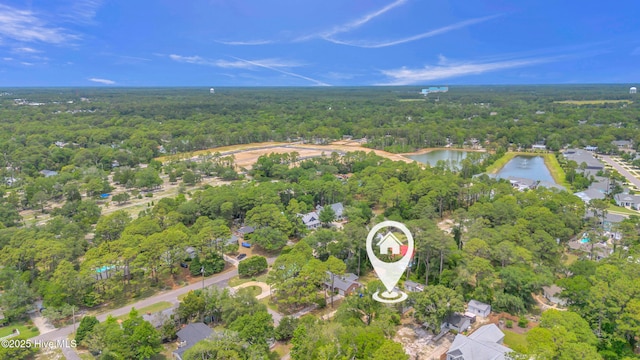 214 Frink Dr, Southport, NC 28461 - aerial overview of property's location with a heavily wooded area and a nearby body of water