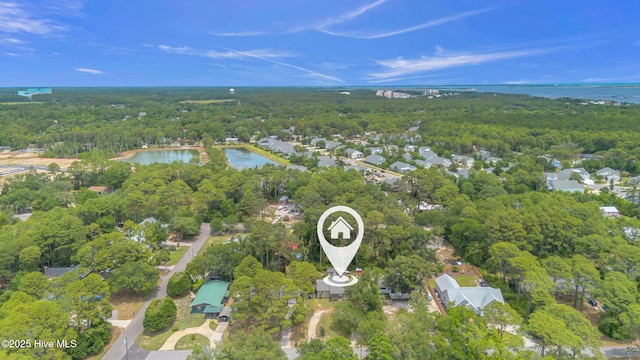 214 Frink Dr, Southport, NC 28461 - aerial view of property and surrounding area featuring a forest and a large body of water