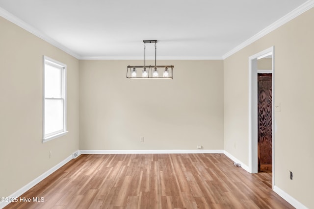 214 Frink Dr, Southport, NC 28461 - empty room featuring ornamental molding, light wood finished floors, and baseboards