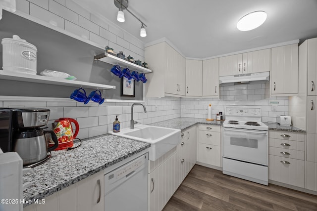 207 Battleground Ave, New Bern, NC 28560 - kitchen with white appliances, under cabinet range hood, tasteful backsplash, open shelves, and dark wood finished floors