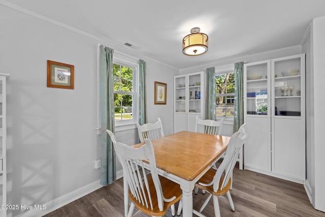 207 Battleground Ave, New Bern, NC 28560 - dining area with wood finished floors and ornamental molding