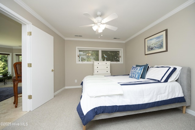 467 Longleaf Dr, West End, NC 27376 - bedroom with light colored carpet, crown molding, baseboards, and a ceiling fan