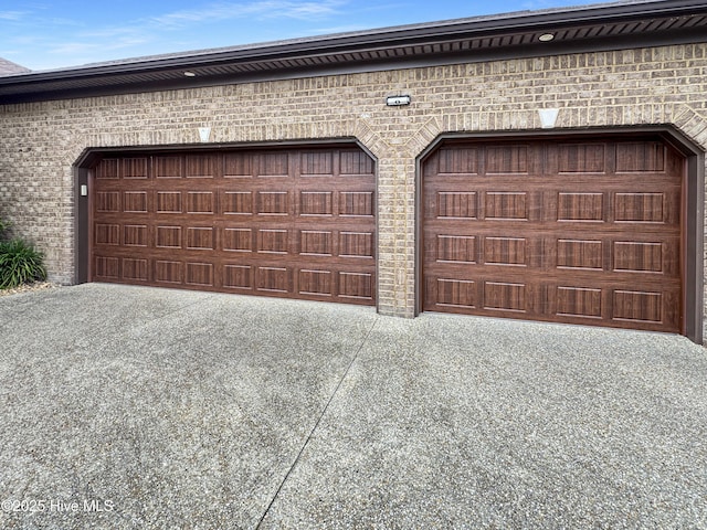6003 Mount Carmel Parke, Wilmington, NC 28412 - garage featuring driveway