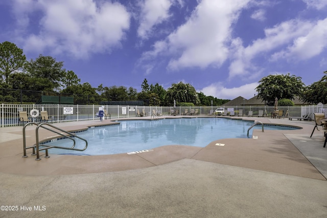 6003 Mount Carmel Parke, Wilmington, NC 28412 - community pool featuring a patio