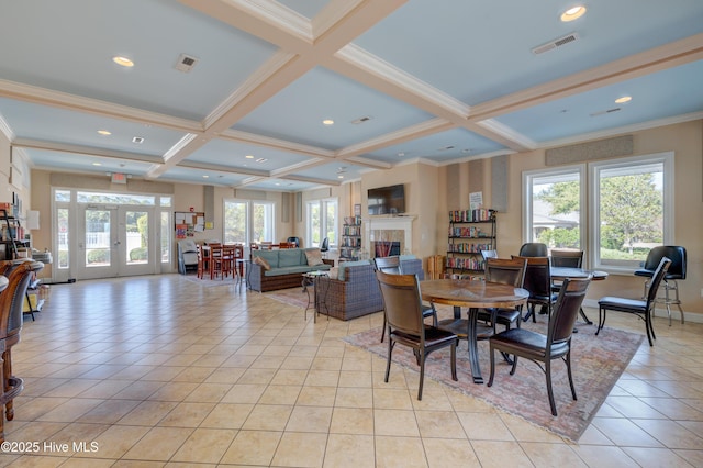 6003 Mount Carmel Parke, Wilmington, NC 28412 - dining room with french doors, beam ceiling, light tile patterned floors, coffered ceiling, and a tile fireplace
