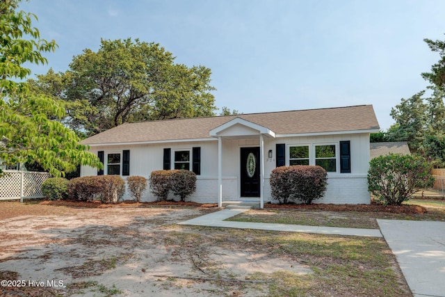326 Cathay Rd, Wilmington, NC 28412 - view of front of property with brick siding and roof with shingles