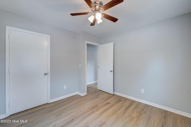 326 Cathay Rd, Wilmington, NC 28412 - unfurnished bedroom with wood finished floors, baseboards, and a ceiling fan