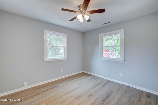 326 Cathay Rd, Wilmington, NC 28412 - unfurnished room with wood finished floors, baseboards, and a ceiling fan