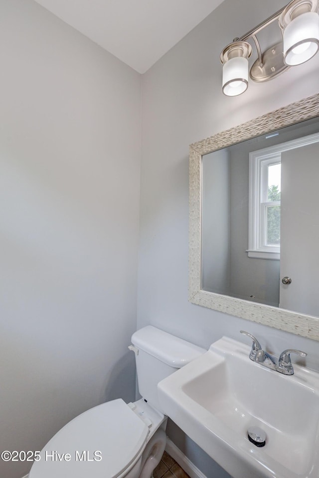 326 Cathay Rd, Wilmington, NC 28412 - half bath featuring a sink and toilet