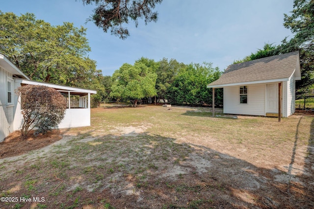 326 Cathay Rd, Wilmington, NC 28412 - view of green lawn with an outbuilding
