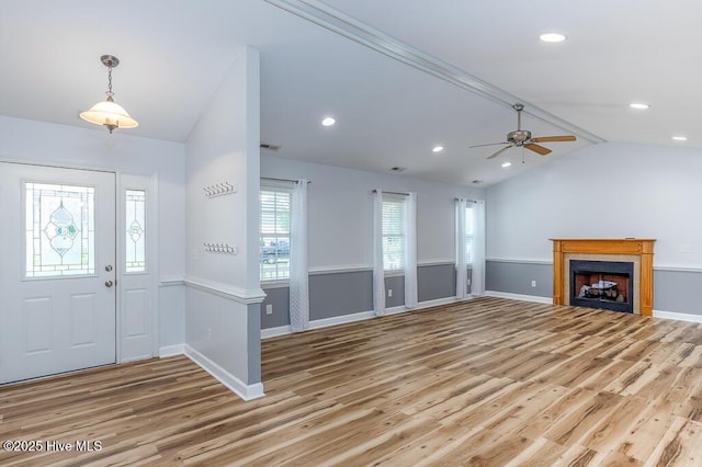 109 Hilda Dr, New Bern, NC 28562 - foyer entrance featuring lofted ceiling, light wood-type flooring, a ceiling fan, a fireplace, and recessed lighting