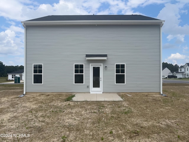 210 Presley St, Raeford, NC 28376 - rear view of property featuring a patio area and central AC unit