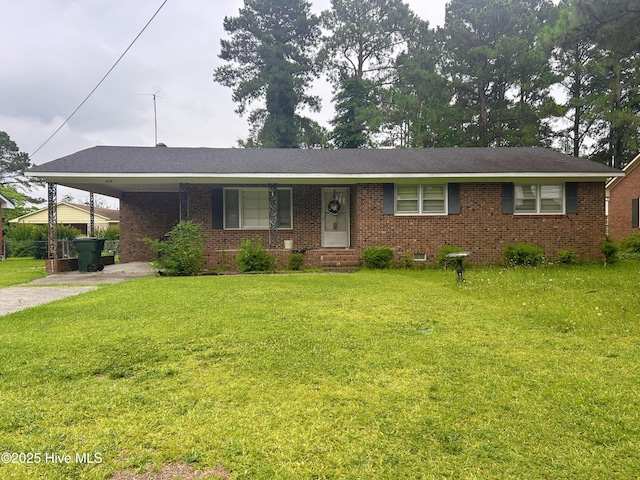 905 Brentwood Dr, Kinston, NC 28501 - single story home with a front lawn, brick siding, an attached carport, and concrete driveway