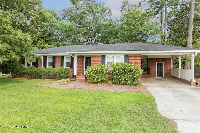 780 Leslie Campbell Ave, Lillington, NC 27546 - single story home with brick siding, driveway, a carport, a front yard, and a shingled roof