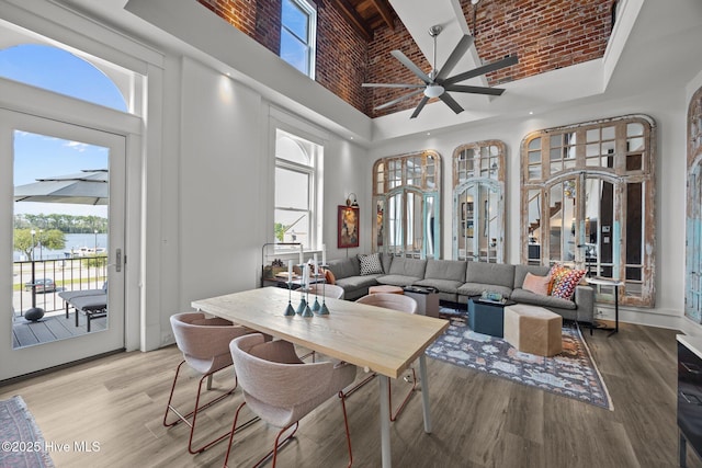 183 W Main St Unit 205, Washington, NC 27889 - living room with a high ceiling, ceiling fan, wood finished floors, and a water view