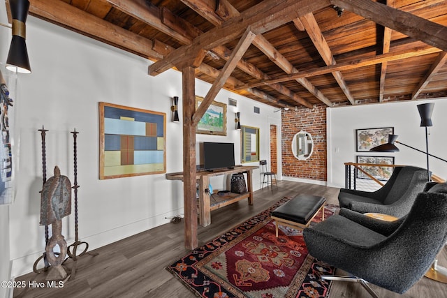 183 W Main St Unit 205, Washington, NC 27889 - living area with a wooden ceiling with exposed beams, wood finished floors, and brick wall
