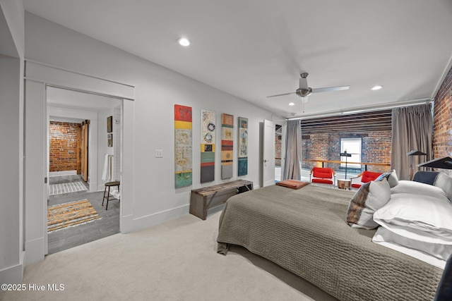 183 W Main St Unit 205, Washington, NC 27889 - carpeted bedroom featuring recessed lighting, brick wall, and a ceiling fan